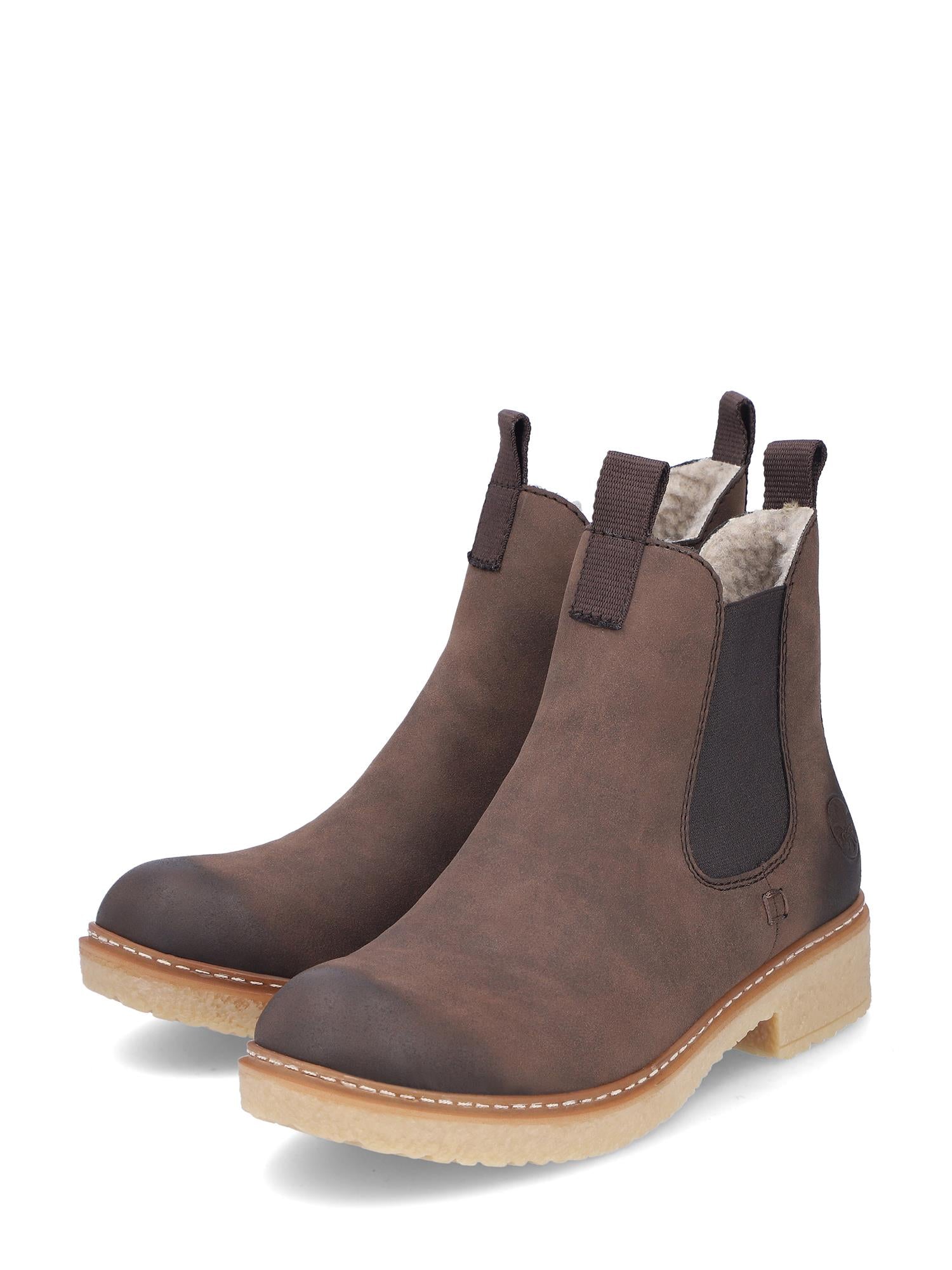 04947 Rieker Brown low Chelsea varmfôret fra Rieker Comfort & Style er en ankelstøvle i brunt skinn med elastiske sidepaneler, trekkfliker og lyse såler, med klassisk design og den karakteristiske antistress-komforten.