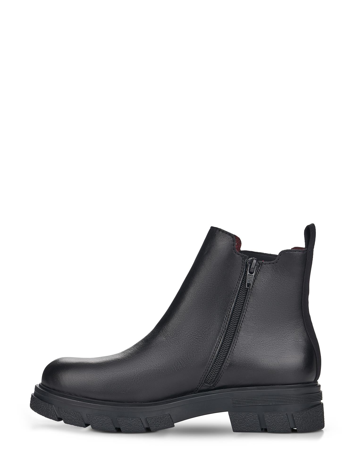 04852 Rieker Lettfòret Chelsea fra Rieker Comfort & Style er en svart ankelstøvel i skinn med chunky såle, glidelås på siden og trekkflik bak, vist i profil på en hvit bakgrunn.