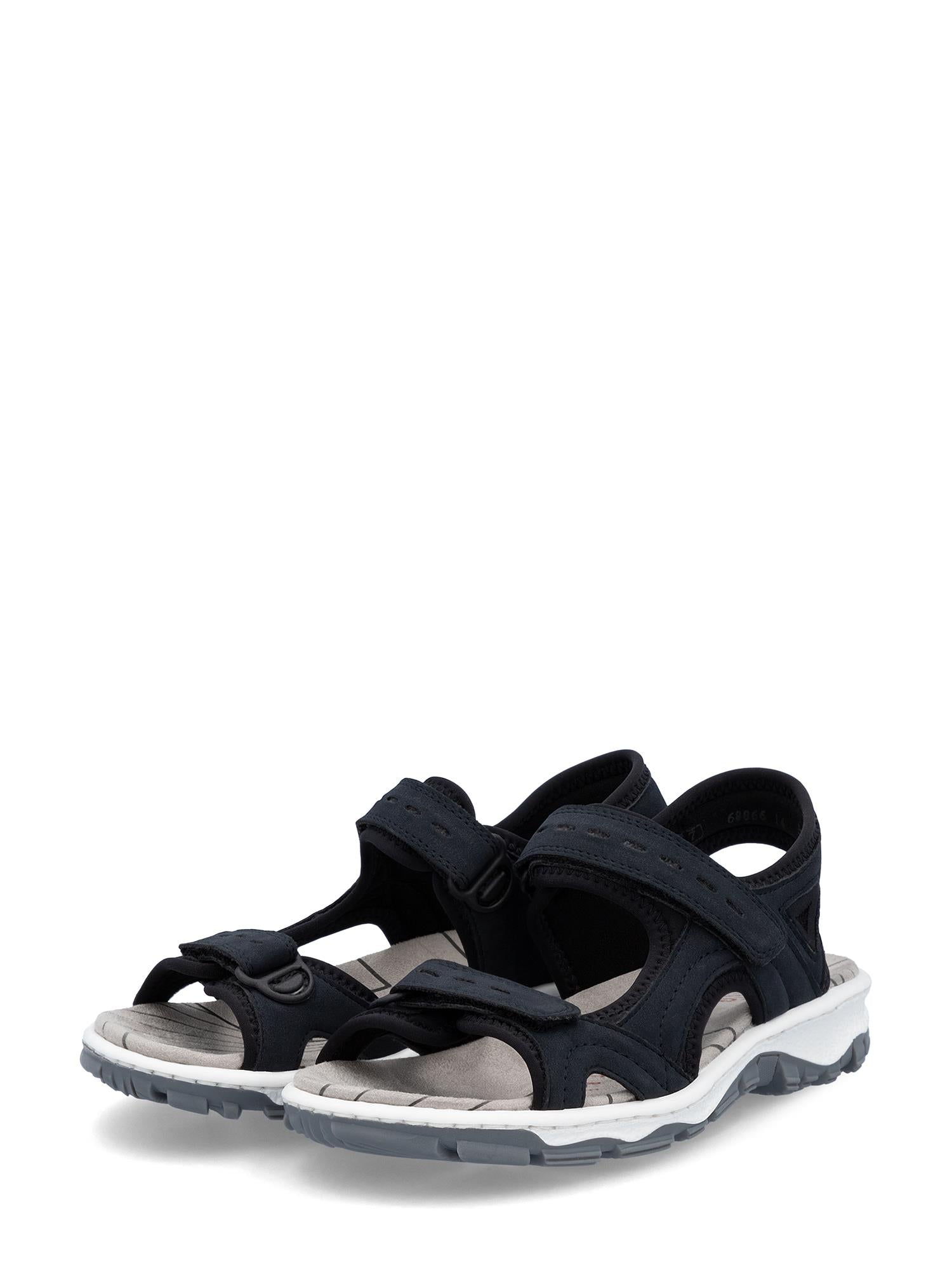 03009 Rieker Marine ComfortWave Sandal fra Rieker Comfort & Style har tykke teksturerte såler og justerbare borrelåsstropper for komfort hele dagen, vist i svart og grått mot en vanlig hvit bakgrunn.