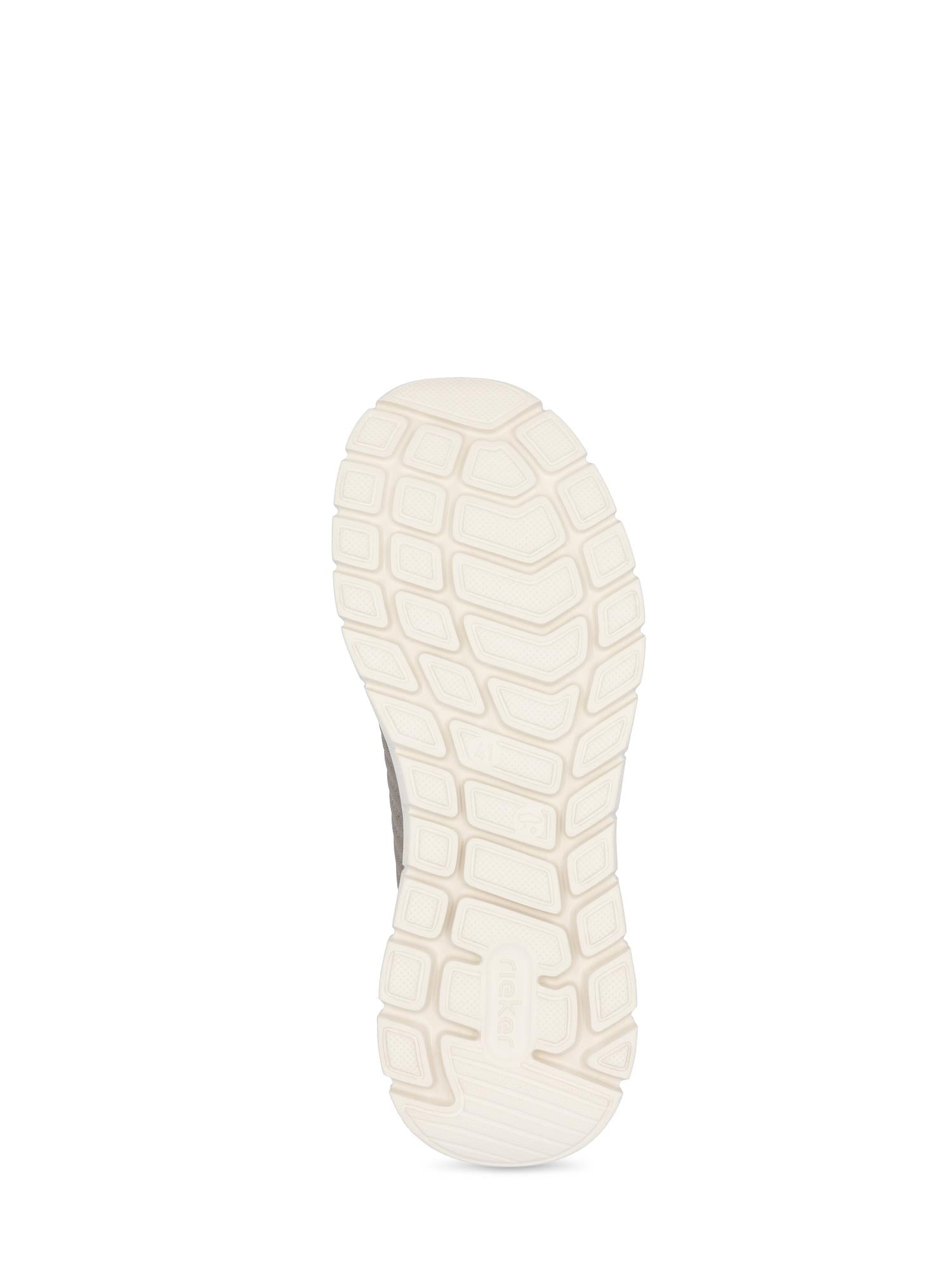 Bildet viser undersiden av 03080 Rieker Elvano Slip-on Sneakers fra Rieker Comfort & Style, med en hvit såle med strukturert, segmentert mønster for grep og ultralett komfort, perfekt for joggesko med Ready2Go-teknologi.