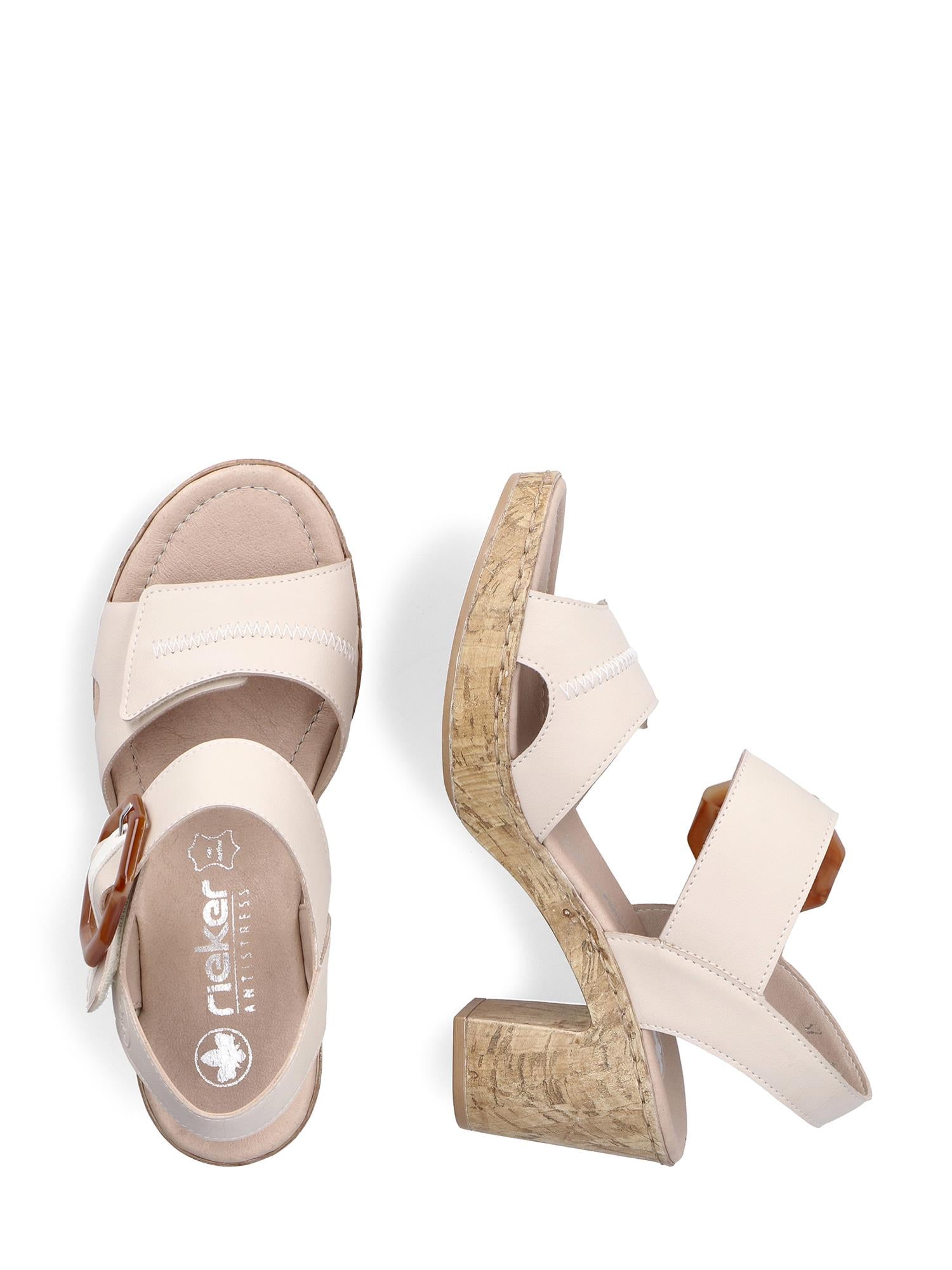 Et par beige, åpne 07639 Rieker Tropical High Sandals fra Rieker Comfort & Style, med blokkhæl i kork, ankelremmer og en brun spenne. Designet for maksimal komfort med Antistress-teknologi. Den ene sandalen viser sålen, den andre en sidevinkel.