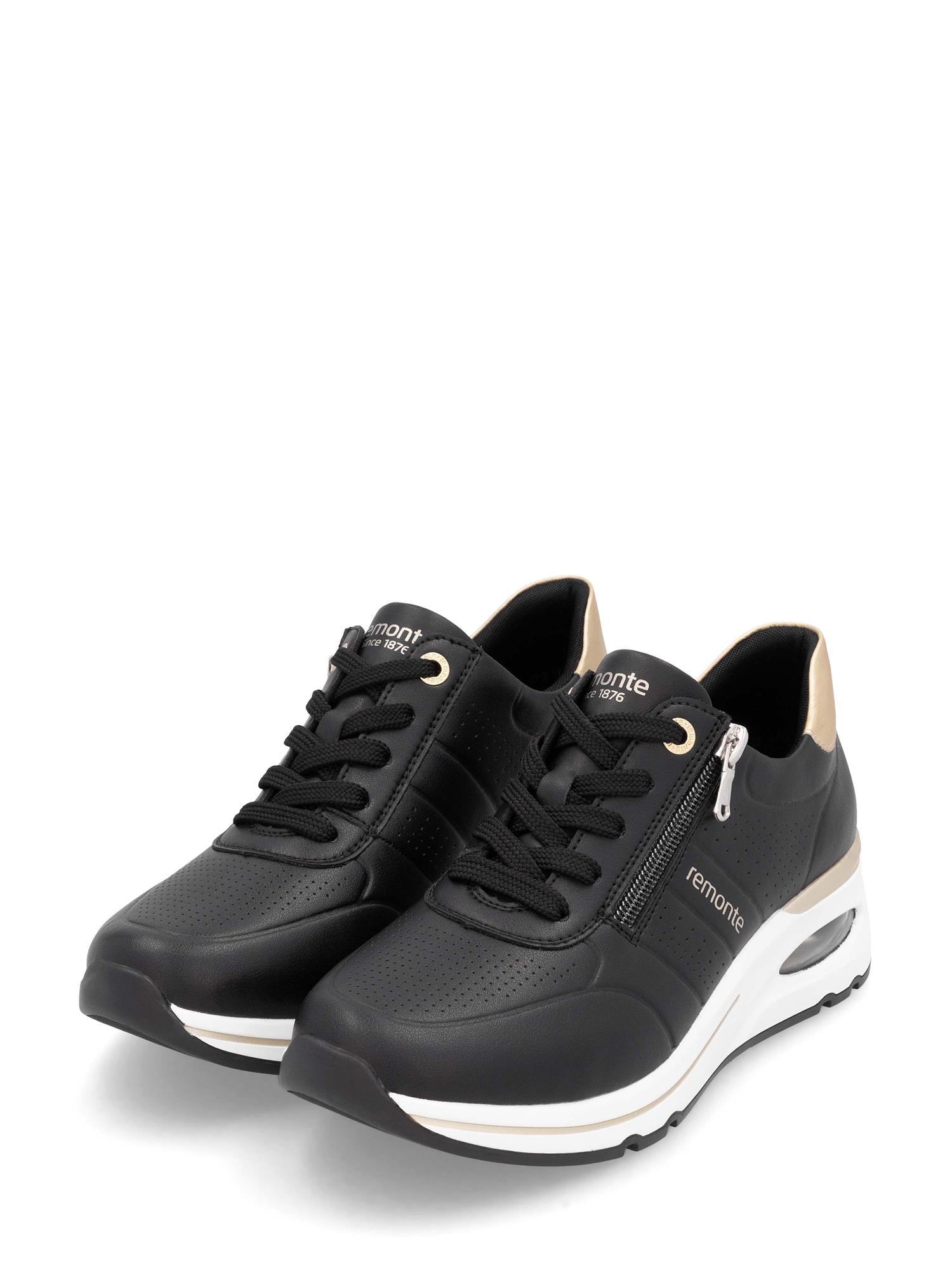 Remonte 03139 Soft Air-Tech Sneakers er svarte damesneakers med hvite såler, beige hældetaljer, glidelåser på siden, Remonte-logo, Antistress-teknologi og perforert tå for komfort og stil.