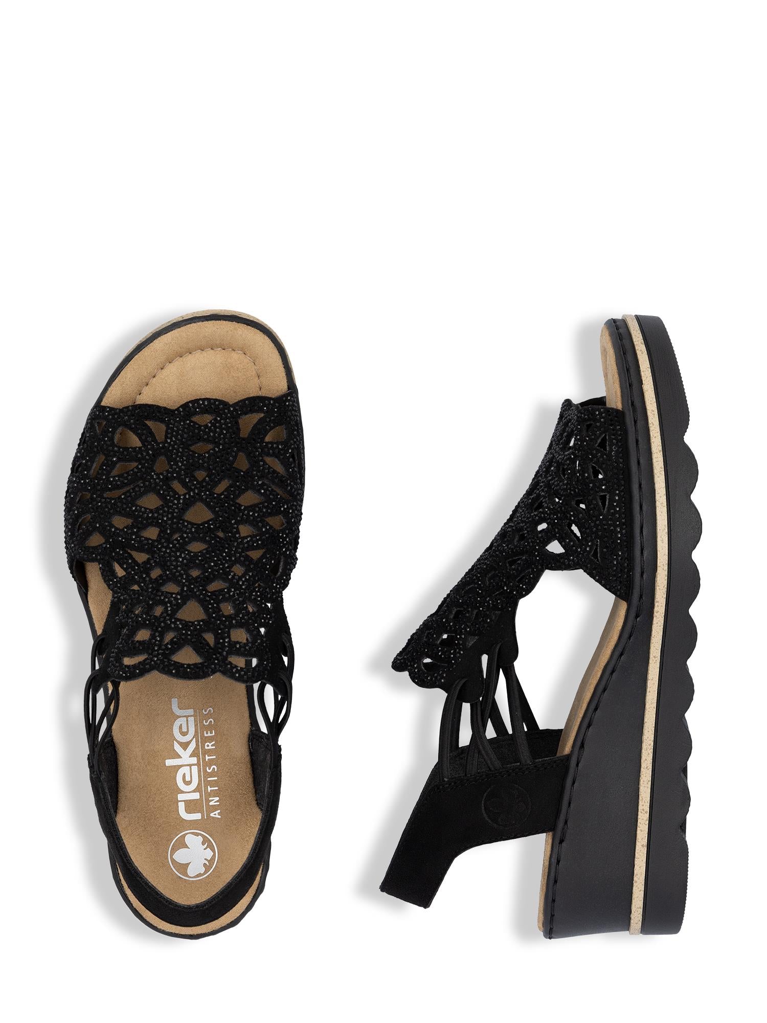 03003 Rieker Sorella Sandal fra Rieker Comfort & Style har svarte, åpne tær, utskåret overdel, lav kilehæl, polstrede solbrune innleggssåler og Antistress-teknologi for komfort hele dagen.