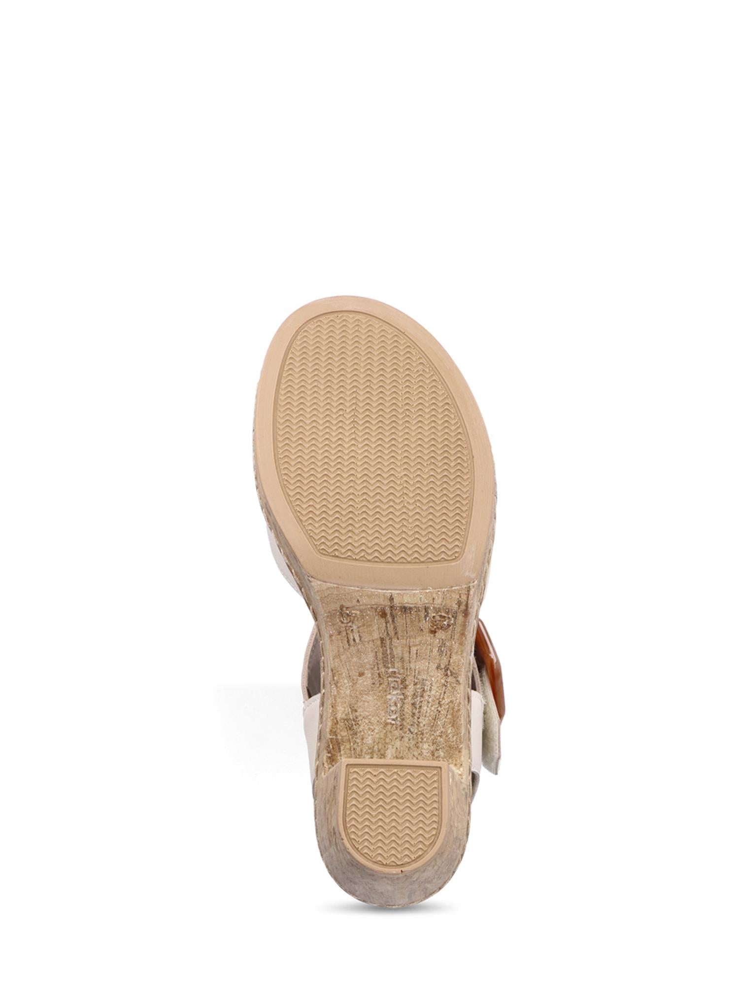 Bildet viser bunnen av 07639 Rieker Tropical High Sandal fra Rieker Comfort & Style, med en brunbrun gummisåle med strukturert grep og bruksspor, som fremhever maksimal komfort og Antistress-teknologi for støtte hele dagen.