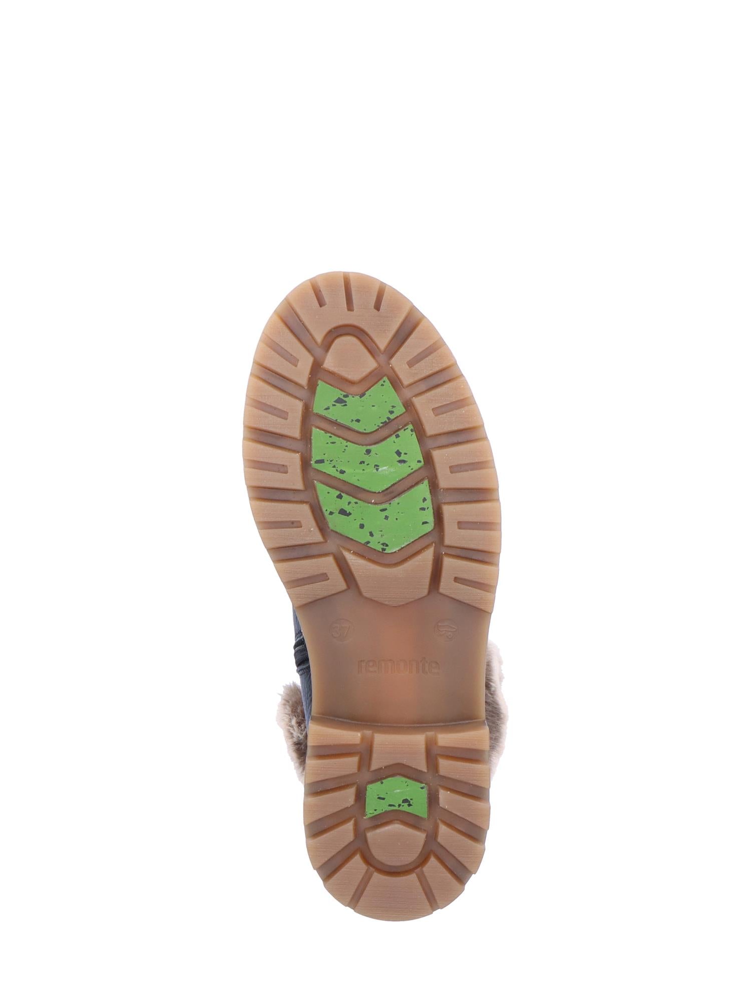 Bildet viser en 04794 Remonte Vintersko skinn ullfôret Fiber-Grip Sort-såle med robust profil, grønne innlegg, synlig ullfôr ved hælen og Remonte-merket preget på sålen.