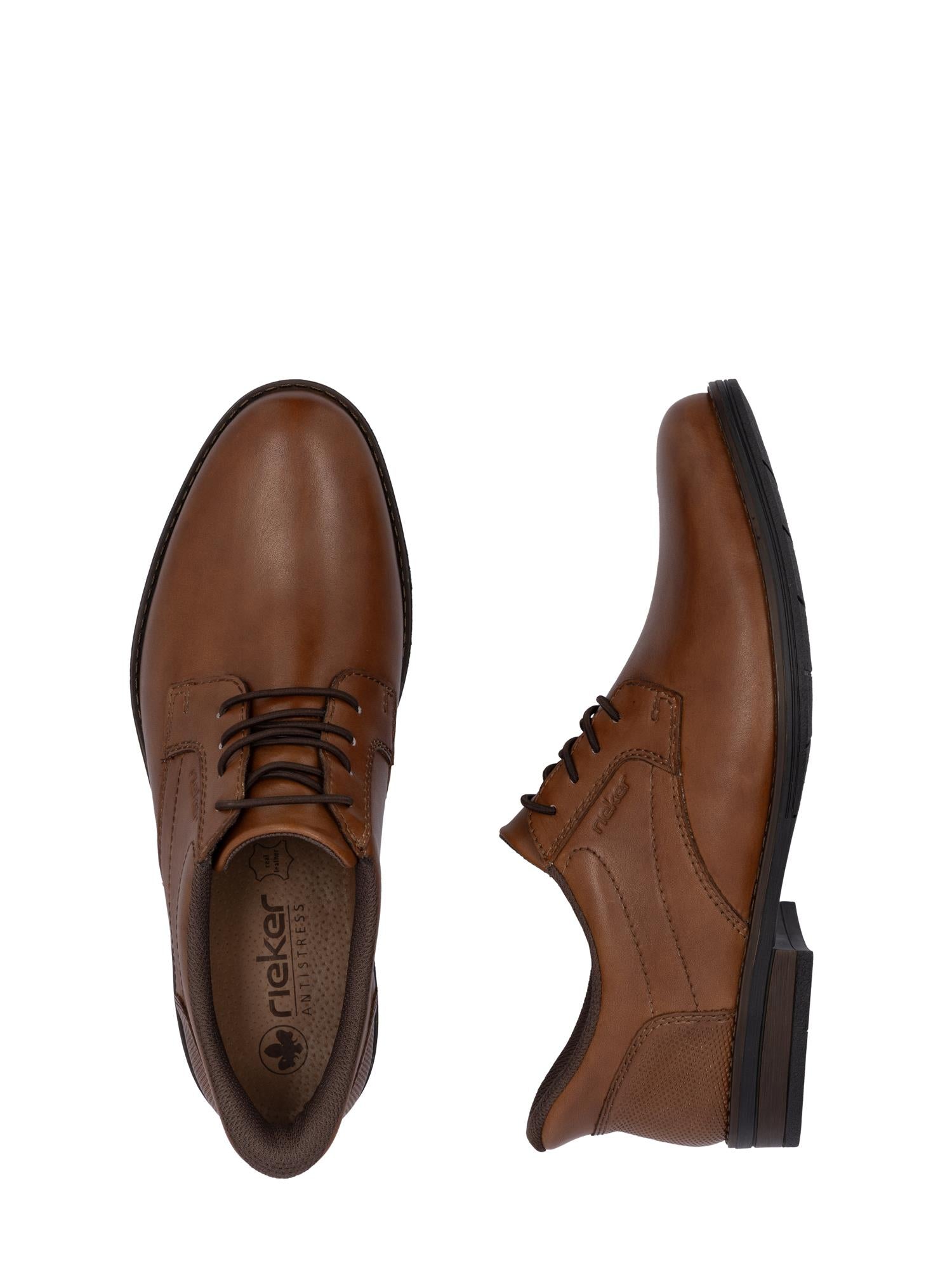 02889 Rieker EasyWalk Slip-Ons fra Rieker Comfort & Style er brune skinnsko med svarte såler, vist ovenfra og fra siden, med subtile sømmer og klassisk komfortsko slip-on-design.