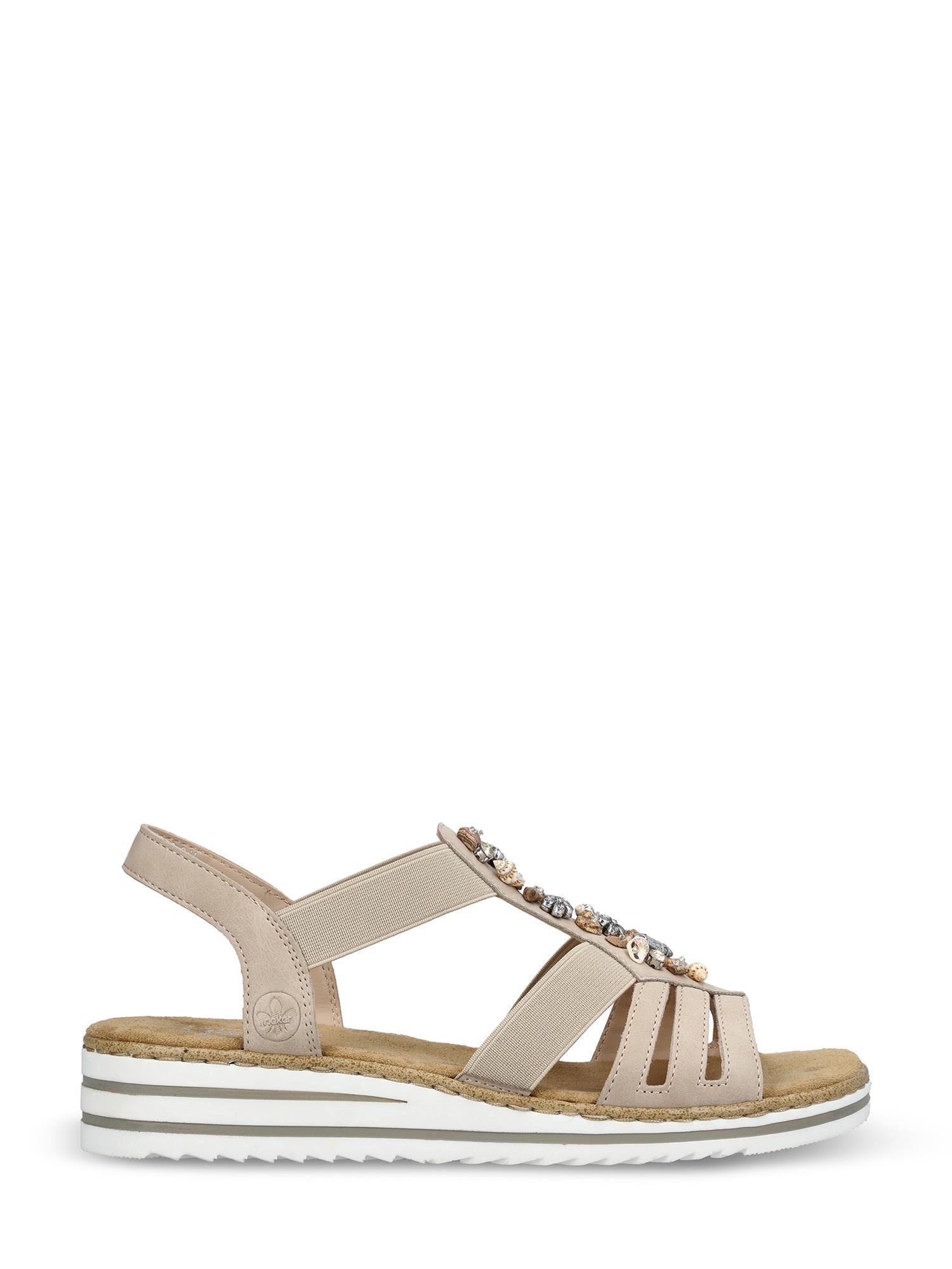 08090 Rieker Crystal Shell sandal fra Rieker Comfort & Style har en beige åpen tå, lav kilehæl, hvit og brun såle, flere remmer med elastiske remmer, dekorative perler og en myk såle for en avslappet hverdagskomfort.