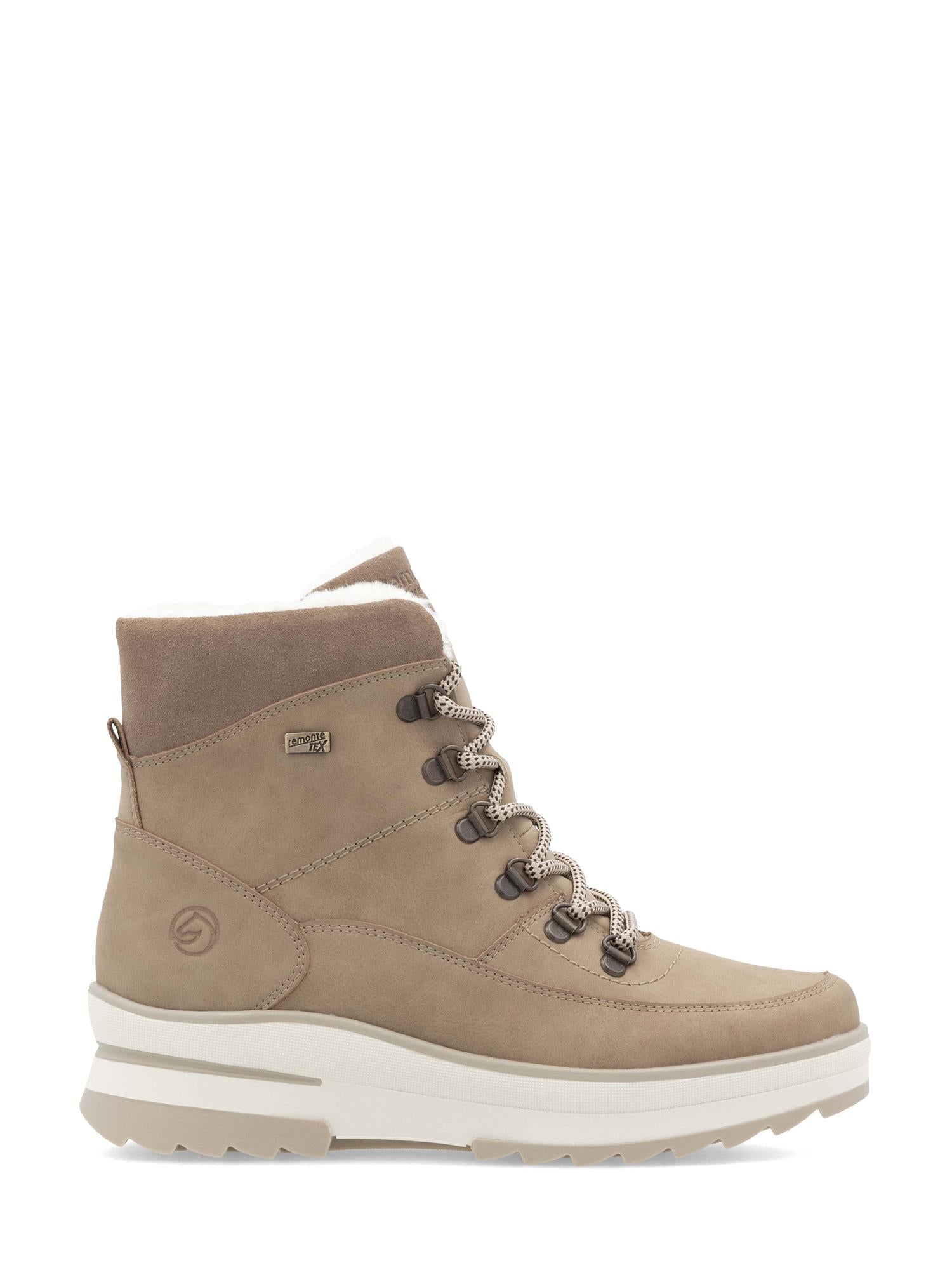 Remonte 05022 Fiber-Grip vinterstøvel har en brun semsket skinnoverdel, tykk hvit såle, metalløyer, beige lisser, kontrastsømmer, logodetaljer, tex-membran og ullfôr - perfekt for utendørsbruk eller vinterbruk.