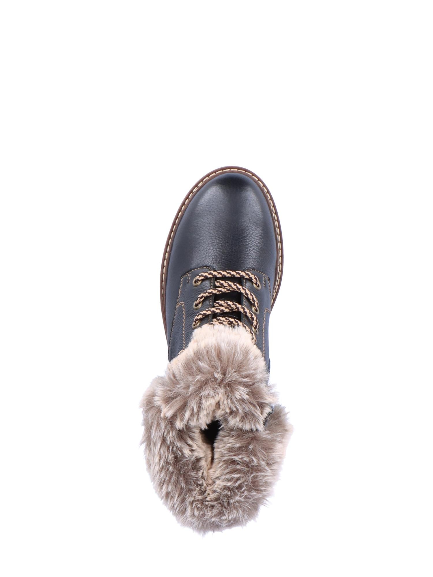 En enkel svart Remonte 04794 vintersko skinn ullfôret Fiber-Grip-støvel med brune lisser og tykt lysebrunt lammeull fôr, sett ovenfra på hvit bakgrunn.