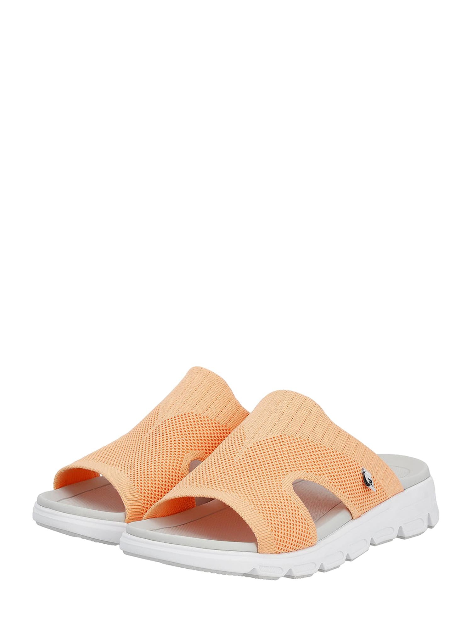 07524 Rieker-Evolution Sunflare Sandal Oransje er en ferskenfarget slip-on sandal for kvinner med overdel i mesh, sideutskjæringer, åpne tær og tykke, hvite gummisåler fra Rieker-Evolution, vist på en hvit bakgrunn.