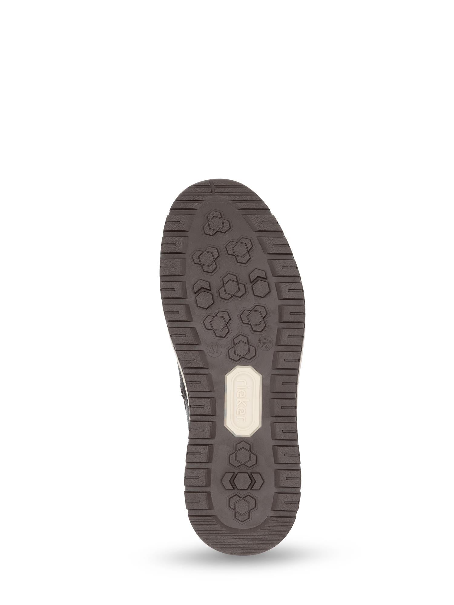 Bildet viser sålen på 04839 Rieker Winter Tex-Membran Boot varmfòret fra Rieker Comfort & Style, med et strukturert mønster og et off-white rektangulært midtparti. Designet har ekstra bred passform for økt komfort.