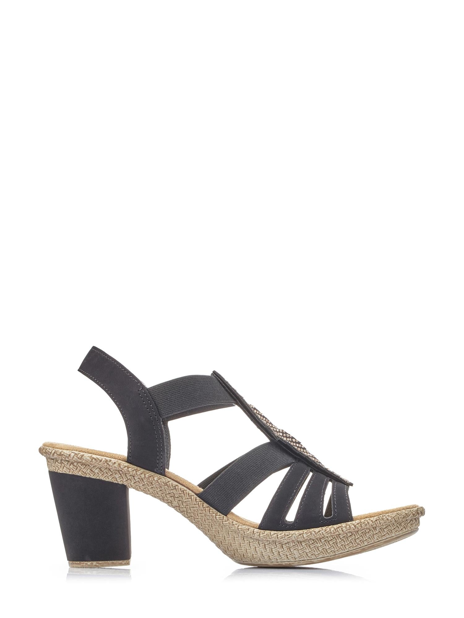 07498 Rieker Feather Heeled Sandal fra Rieker Comfort & Style har en svart åpen tå, utskårne stropper, en tykk middels høy hæl, vevd såle og en elastisk ankelstropp for komfort og enkel bruk.