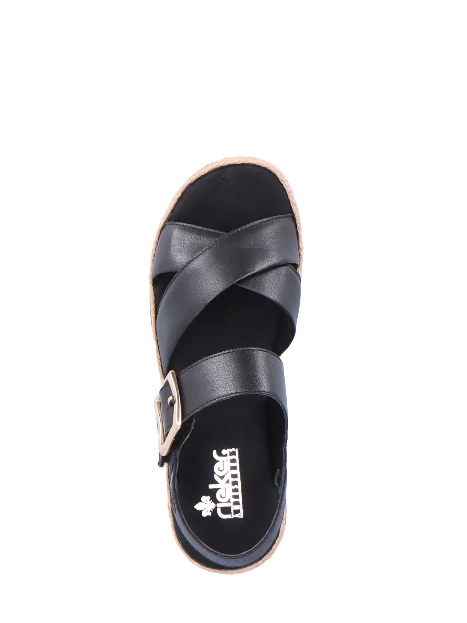08084 Rieker Arizona Sandal Black Leather fra Rieker Comfort & Style har reimer på kryss og tvers, en stor spenne på siden og en myk fotseng som gir god komfort. En lysebrun, strukturert kant og hvitt "Rieker"-merke på innersålen gir stilfulle detaljer.