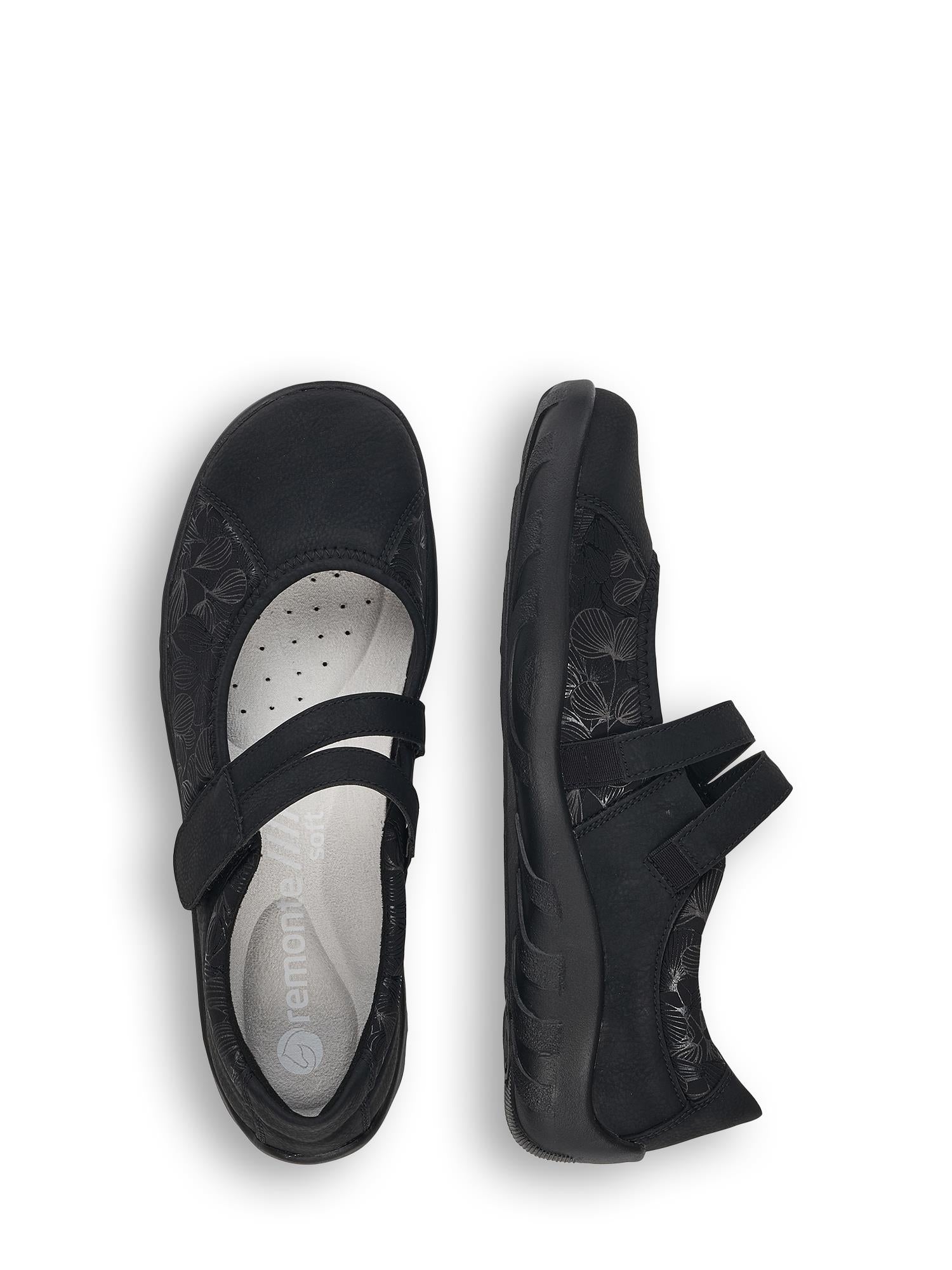 To svarte Remonte 03296 Motion Sneakers med subtile blomstermønstre og to velcrostropper er vist ovenfra på en hvit bakgrunn. Den venstre skoen viser innersålen, mens den høyre viser yttersiden.